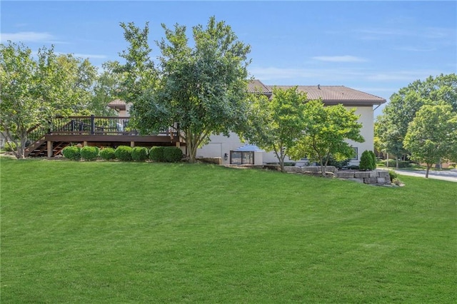 view of yard with a deck