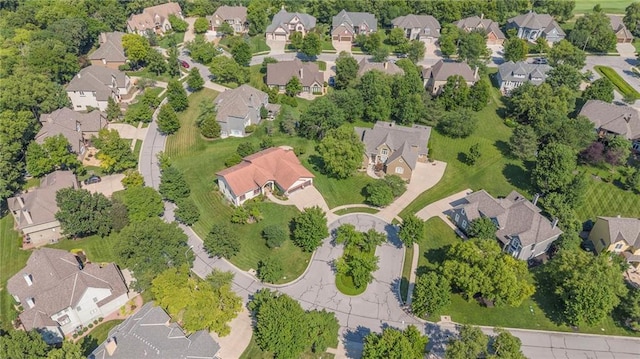 birds eye view of property with a residential view