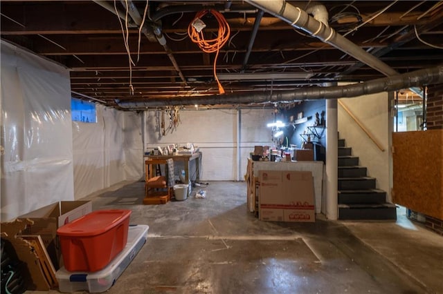 unfinished basement with stairs