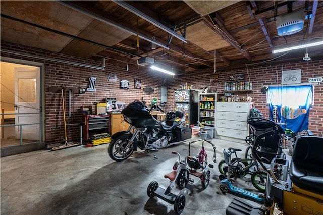 garage with electric panel and a garage door opener