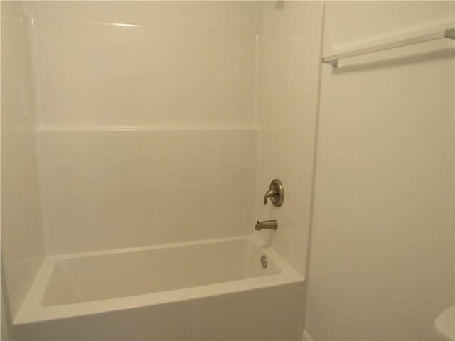 full bathroom featuring  shower combination