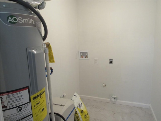 washroom with hookup for a washing machine, electric water heater, hookup for an electric dryer, laundry area, and marble finish floor