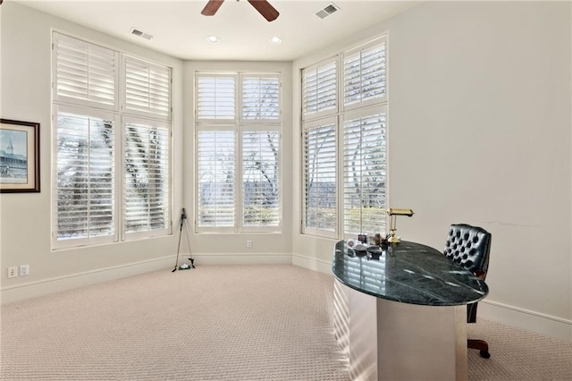 office area featuring visible vents and plenty of natural light