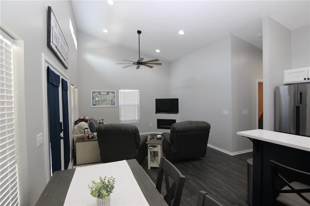 home office featuring dark wood finished floors, recessed lighting, baseboards, and a ceiling fan