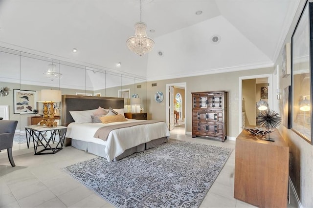 bedroom featuring high vaulted ceiling and a chandelier