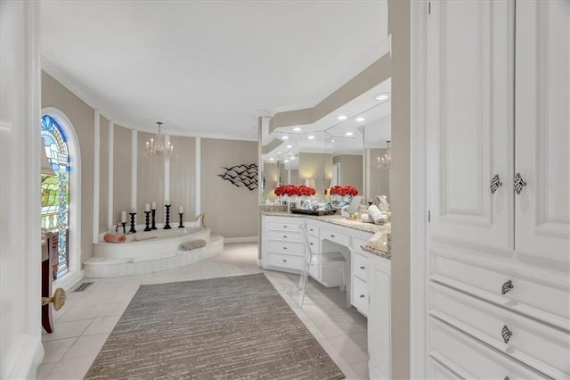 full bathroom with a tub to relax in, recessed lighting, tile patterned flooring, a chandelier, and vanity