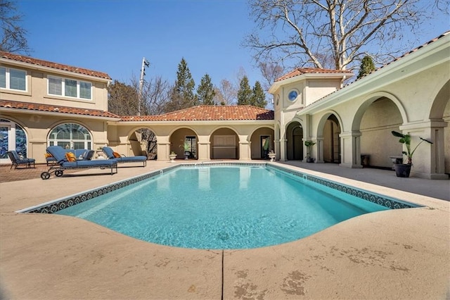 pool with a patio area