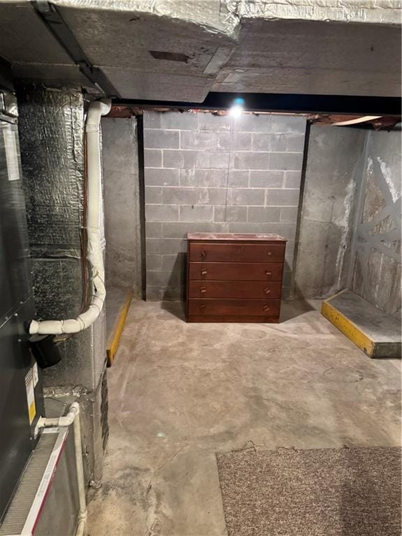 unfinished below grade area with heating unit