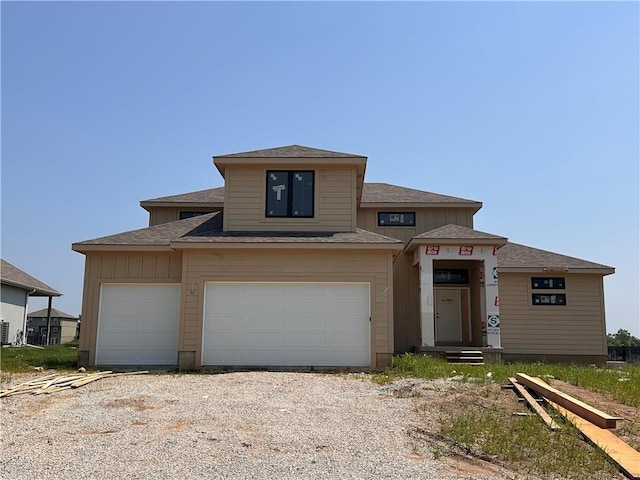 2333 Fishing Ln, Kearney, MO 64060 - prairie-style home featuring gravel driveway and roof with shingles