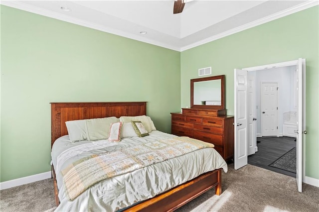 bedroom with visible vents, baseboards, a ceiling fan, carpet, and crown molding