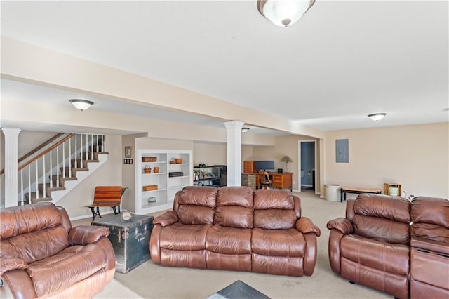 living room featuring electric panel, light colored carpet, decorative columns, and stairway