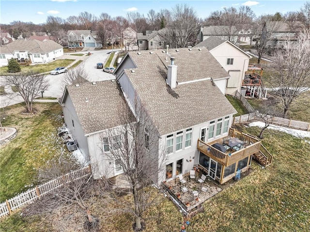 birds eye view of property with a residential view