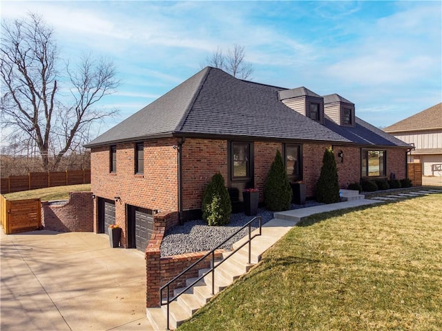 view of front of home featuring brick siding, concrete driveway, a garage, and roof with shingles