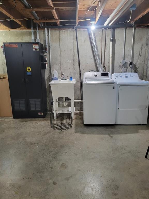 unfinished below grade area with heating unit and separate washer and dryer