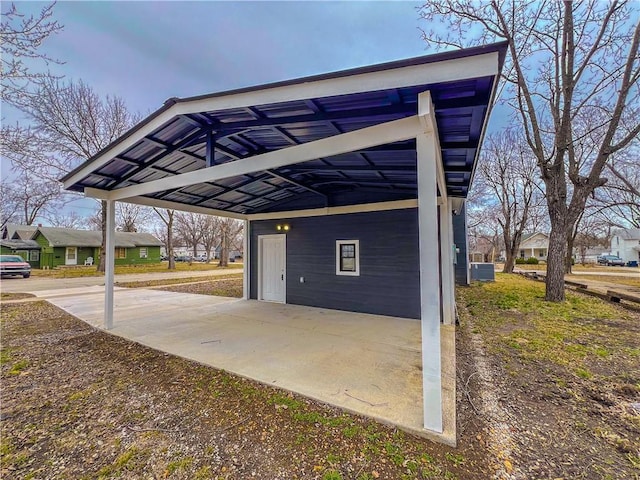 view of parking with a carport