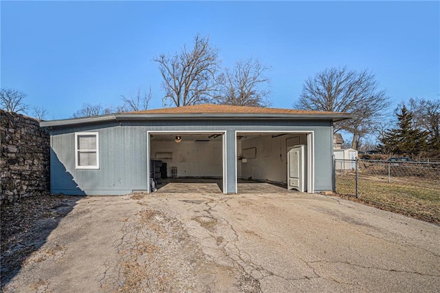 detached garage with fence