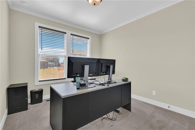 home office featuring light colored carpet, baseboards, and ornamental molding