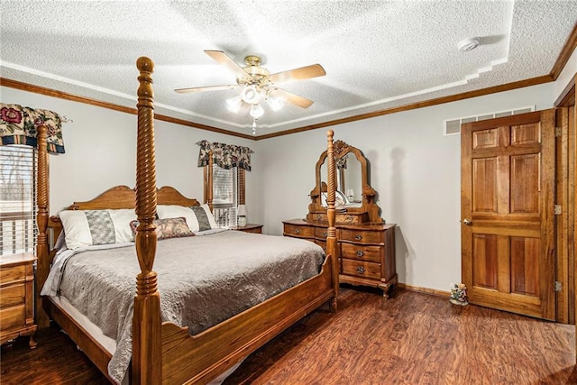 bedroom with a ceiling fan, baseboards, ornamental molding, dark wood-type flooring, and a textured ceiling