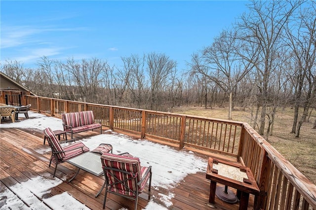 view of snow covered deck