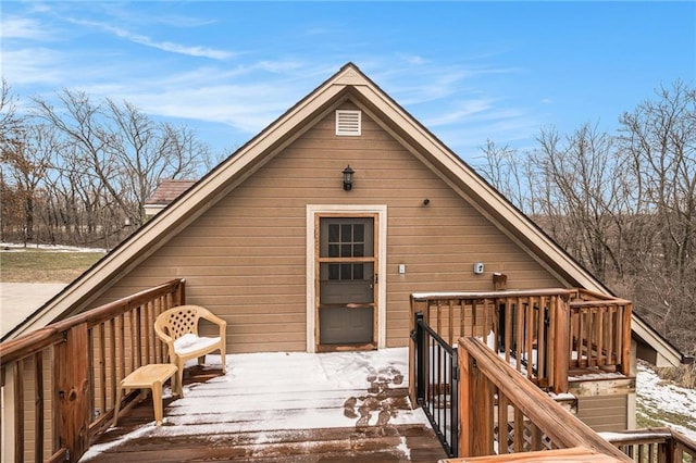 view of snow covered deck