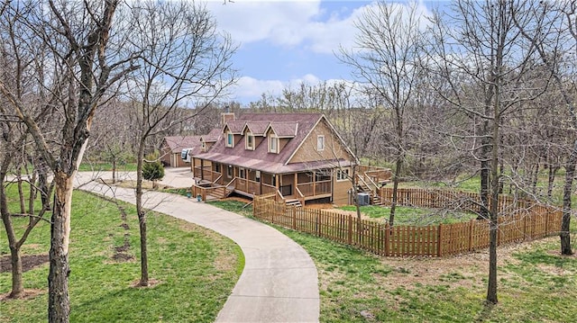 4623 Whispering Oaks Ln, Smithville, MO 64089 - exterior space featuring a yard, a fenced front yard, a chimney, and a porch
