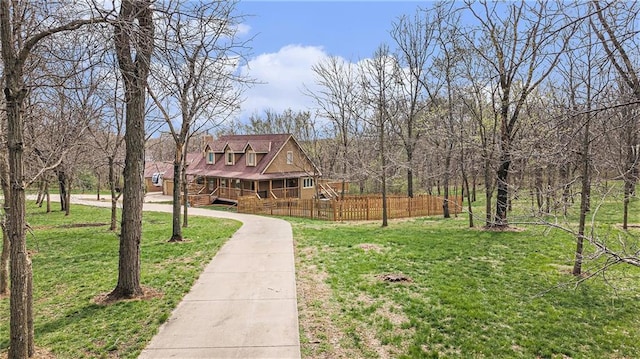 4623 Whispering Oaks Ln, Smithville, MO 64089 - exterior space featuring fence and a yard