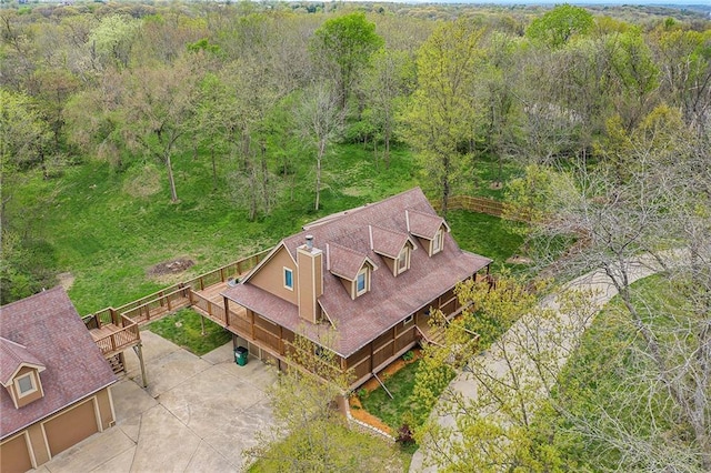 4623 Whispering Oaks Ln, Smithville, MO 64089 - birds eye view of property featuring a wooded view