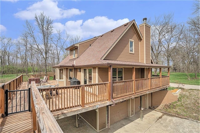 4623 Whispering Oaks Ln, Smithville, MO 64089 - rear view of house featuring a chimney, roof with shingles, and a wooden deck