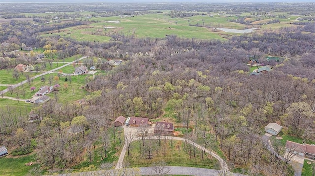 4623 Whispering Oaks Ln, Smithville, MO 64089 - aerial view featuring a wooded view
