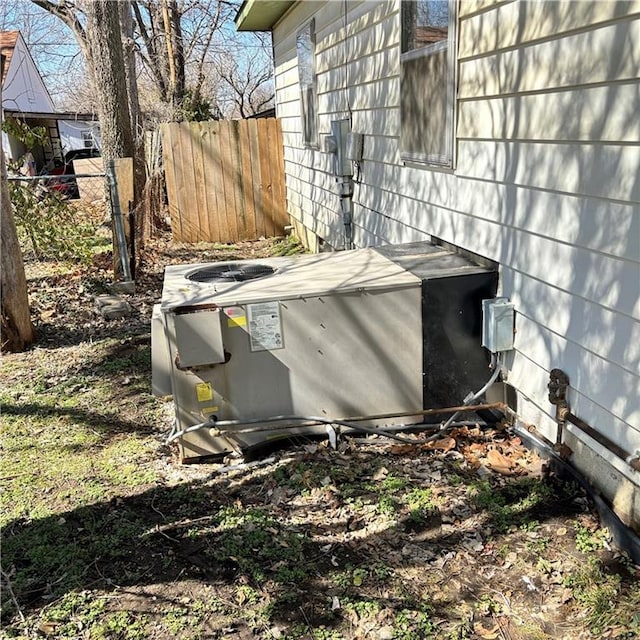 details with fence and central air condition unit