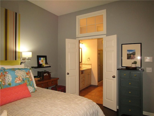 tiled bedroom with baseboards