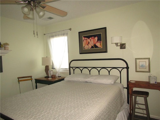 bedroom with visible vents and ceiling fan