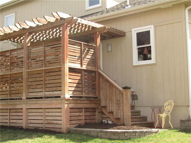 deck featuring a pergola and stairs