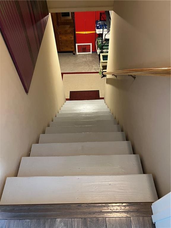 staircase featuring visible vents