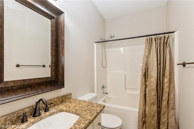 full bathroom with shower / bath combo with shower curtain, toilet, and vanity