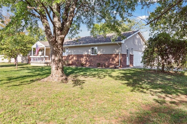 exterior space with a wooden deck, a front yard, and brick siding