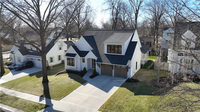 view of front of home featuring a garage, concrete driveway, a front yard, and a shingled roof