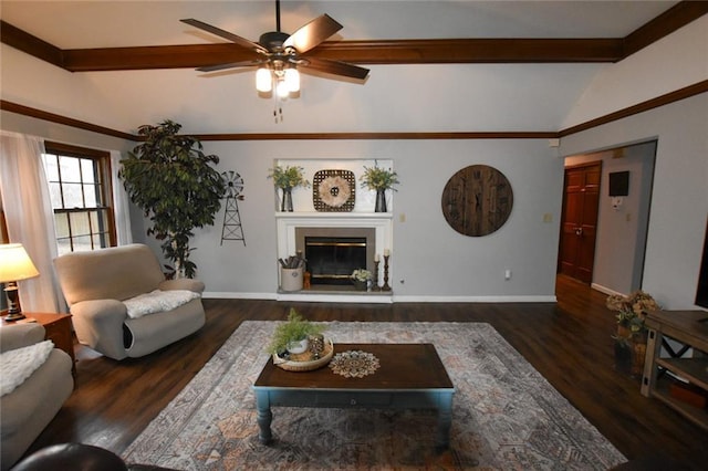 living area featuring a glass covered fireplace, vaulted ceiling with beams, wood finished floors, and baseboards