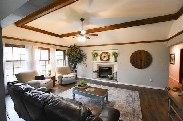 living room featuring wood finished floors, baseboards, lofted ceiling, ceiling fan, and a glass covered fireplace