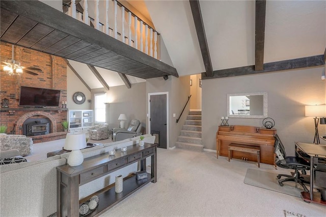 carpeted living room with stairs, high vaulted ceiling, and beamed ceiling