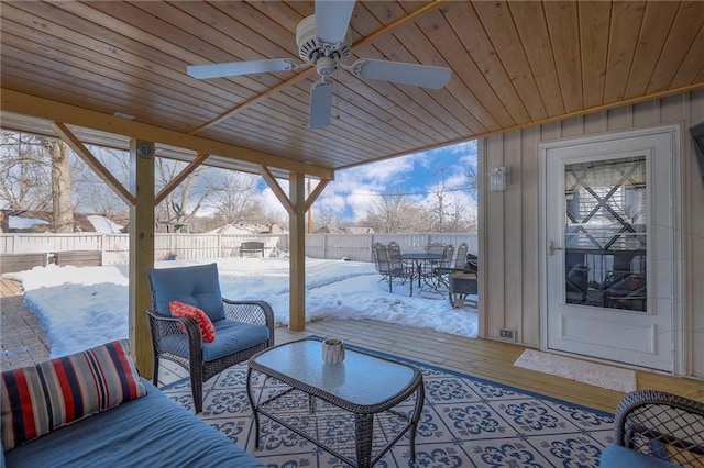 view of patio with ceiling fan, outdoor dining space, an outdoor hangout area, and a fenced backyard