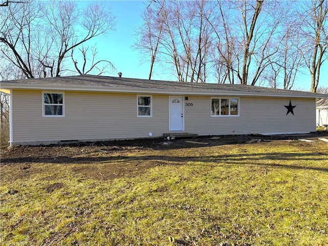 single story home featuring a front yard