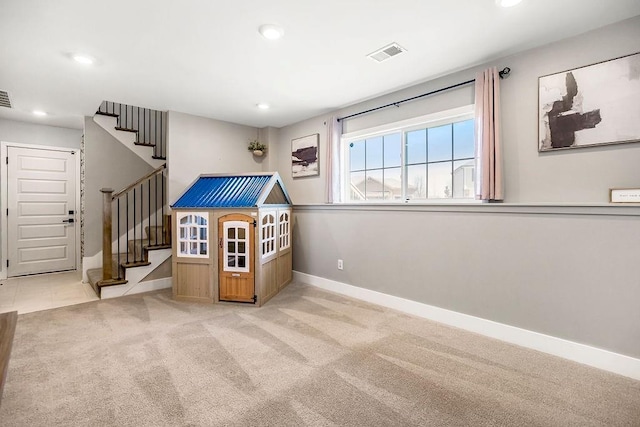 interior space with stairs, recessed lighting, baseboards, and visible vents