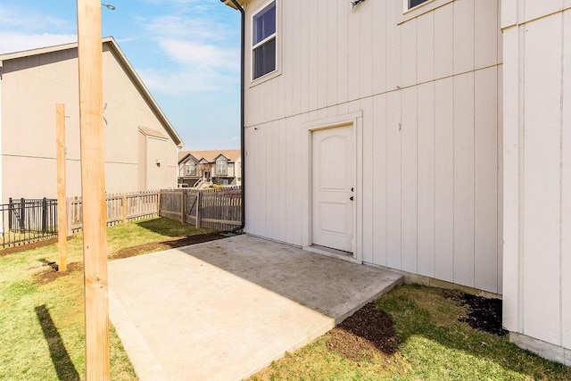 view of patio / terrace featuring fence