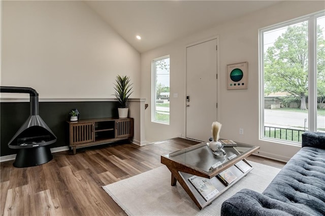 4413 E 135th St, Grandview, MO 64030 - living area featuring wood finished floors, lofted ceiling, recessed lighting, and baseboards