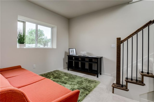 4413 E 135th St, Grandview, MO 64030 - carpeted living room featuring stairs