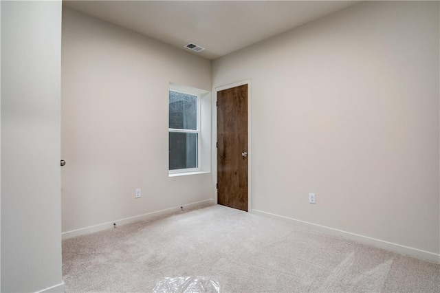 4413 E 135th St, Grandview, MO 64030 - empty room featuring light colored carpet and baseboards