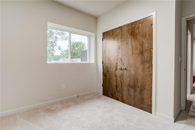 4413 E 135th St, Grandview, MO 64030 - unfurnished room featuring carpet floors and baseboards