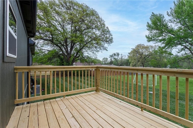 4413 E 135th St, Grandview, MO 64030 - wooden deck featuring a yard