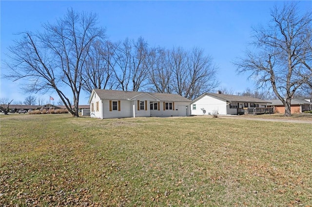 ranch-style house with a front yard